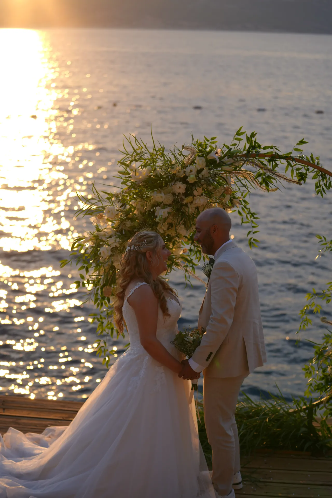 Couple surrounded by dramatic sparkler curtain at night