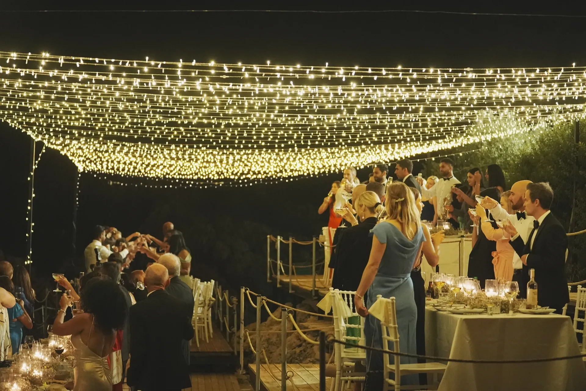 Reception venue with cascading fairy light curtain installation