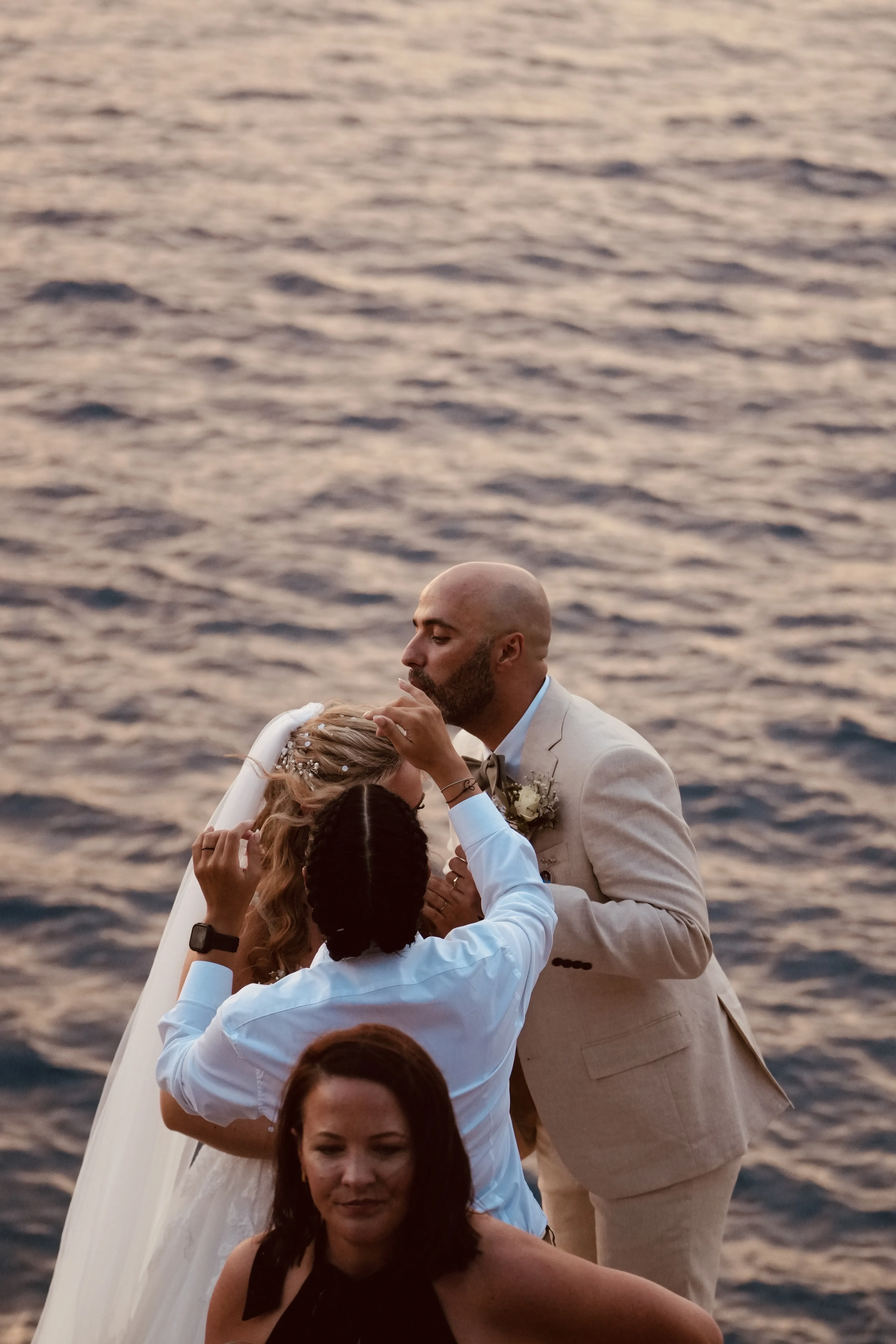 Intimate wedding ceremony with officiant at Mediterranean venue