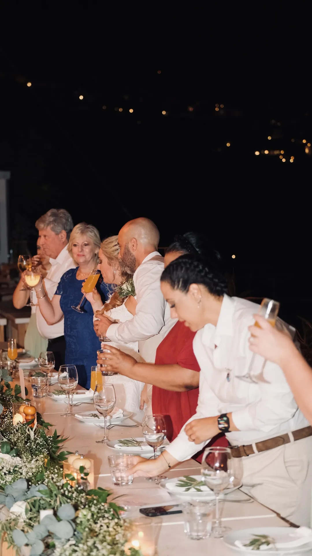 Emotional multi-generational guests during reception toast