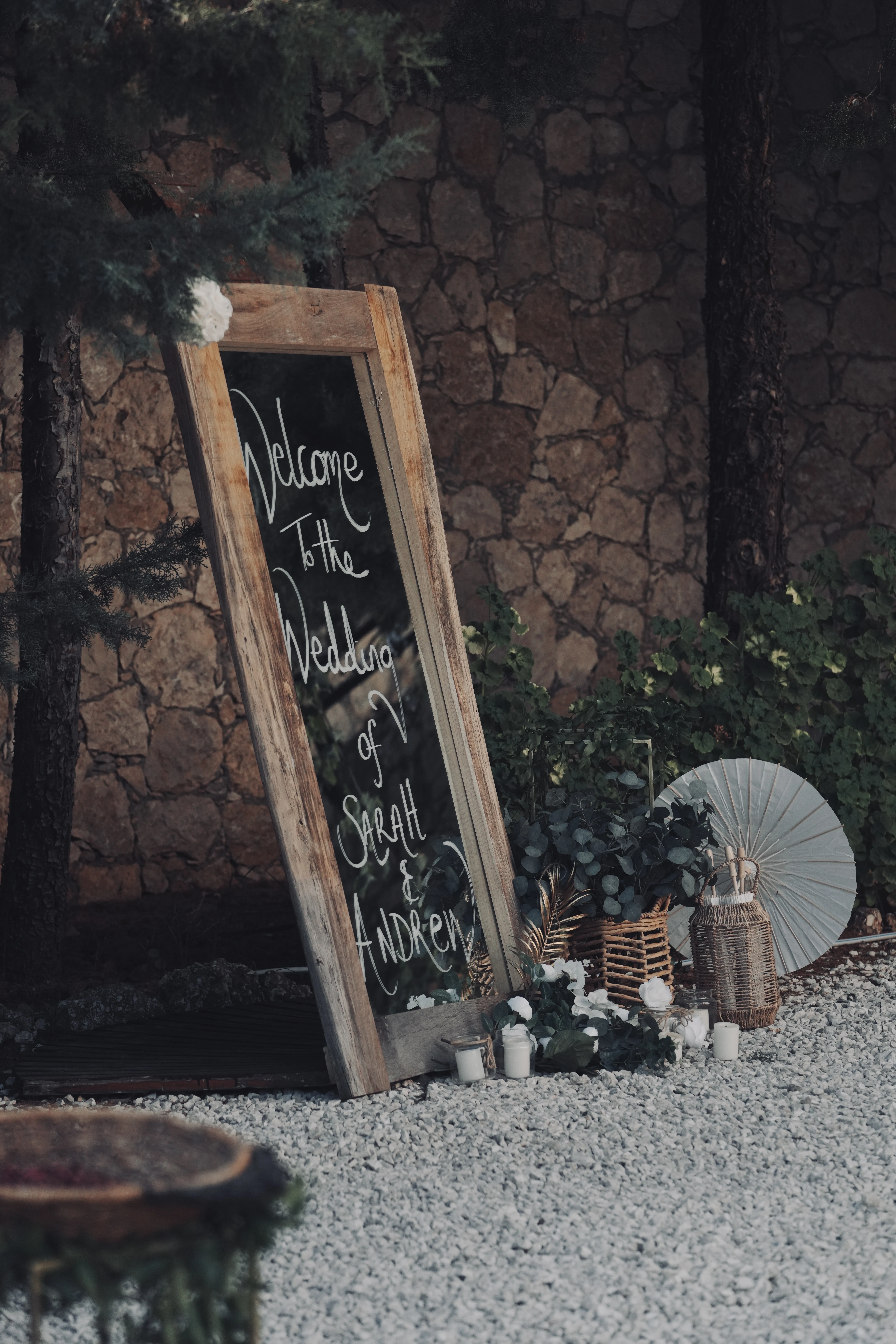 Rustic welcome chalkboard sign with bohemian decorative elements